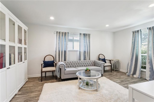 6909 Asher St, Metairie, LA 70003 - living area featuring wood finished floors and recessed lighting