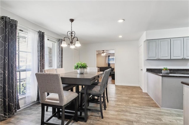 6909 Asher St, Metairie, LA 70003 - dining area with plenty of natural light, light wood-style floors, and recessed lighting