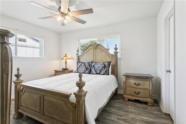 6909 Asher St, Metairie, LA 70003 - bedroom featuring multiple windows, dark wood finished floors, and ceiling fan