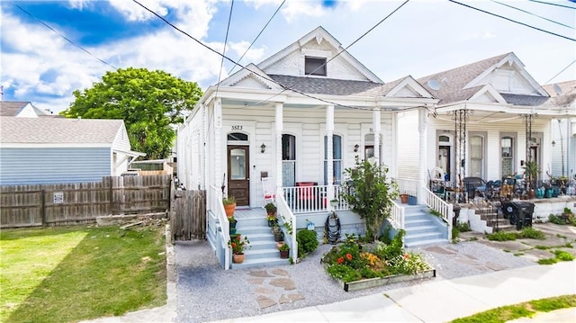 352123 Cleveland Ave, New Orleans, LA 70119 - shotgun-style home with covered porch