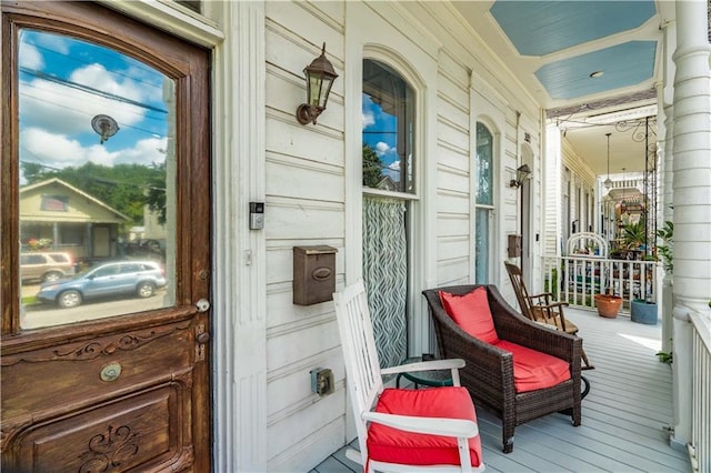 352123 Cleveland Ave, New Orleans, LA 70119 - doorway to property featuring a porch