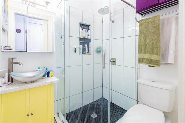 352123 Cleveland Ave, New Orleans, LA 70119 - bathroom featuring vanity, a stall shower, and toilet