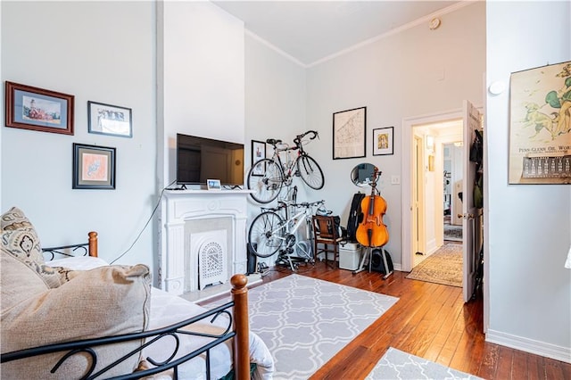 352123 Cleveland Ave, New Orleans, LA 70119 - office with hardwood / wood-style flooring, ornamental molding, baseboards, and a towering ceiling