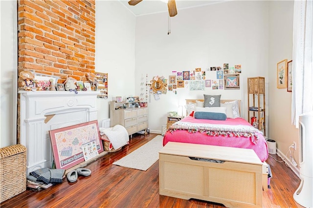 352123 Cleveland Ave, New Orleans, LA 70119 - bedroom featuring hardwood / wood-style flooring, a ceiling fan, and baseboards