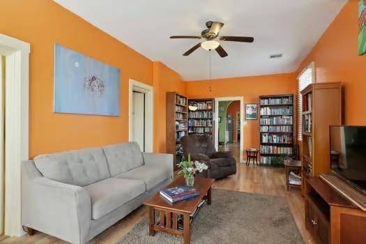 640 Lizardi St, New Orleans, LA 70117 - living room with ceiling fan and wood finished floors