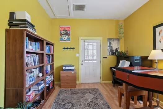 640 Lizardi St, New Orleans, LA 70117 - home office with wood finished floors and baseboards