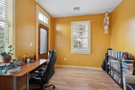 640 Lizardi St, New Orleans, LA 70117 - office space with light wood-type flooring and baseboards