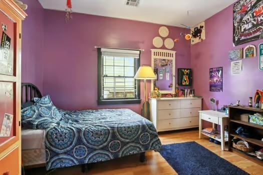 640 Lizardi St, New Orleans, LA 70117 - bedroom with wood finished floors