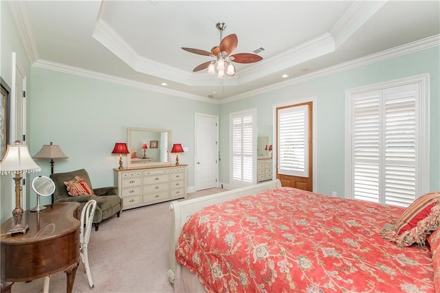 23783 Monarch Pt, Springfield, LA 70462 - bedroom featuring carpet, crown molding, a raised ceiling, and a ceiling fan