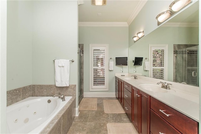 23783 Monarch Pt, Springfield, LA 70462 - full bathroom with a shower stall, a jetted tub, double vanity, crown molding, and baseboards