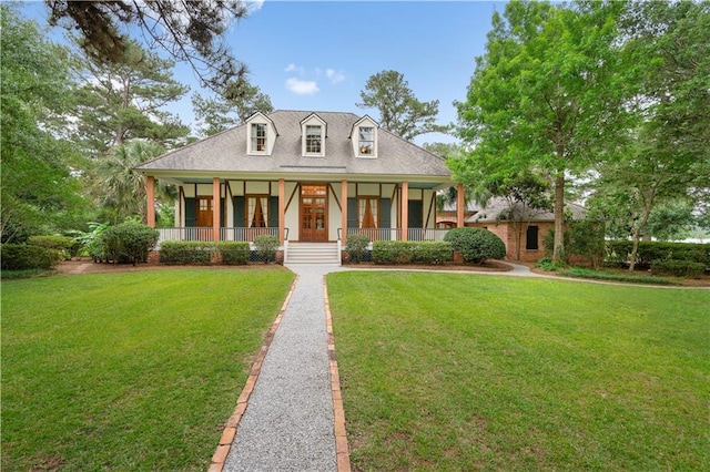 580 Northwoods Dr, Abita Springs, LA 70420 - view of front of property with a porch and a front yard