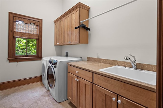 580 Northwoods Dr, Abita Springs, LA 70420 - washroom with cabinet space, washing machine and dryer, and baseboards