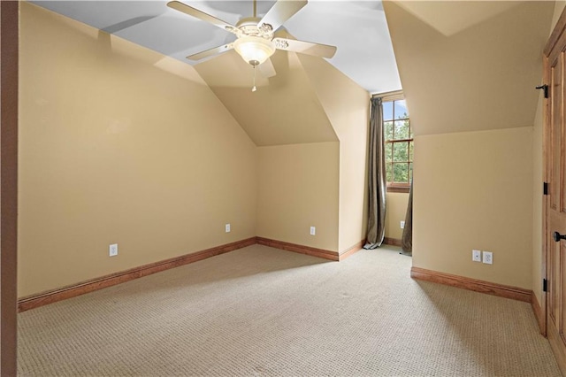 580 Northwoods Dr, Abita Springs, LA 70420 - additional living space with light carpet, a ceiling fan, baseboards, and lofted ceiling