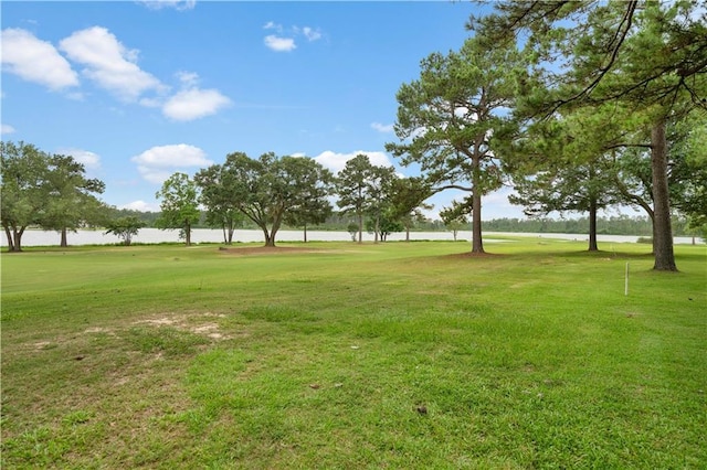 580 Northwoods Dr, Abita Springs, LA 70420 - view of home's community featuring a yard, view of golf course, and a water view