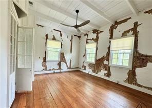110 Mulberry Ave, Mandeville, LA 70448 - empty room with hardwood / wood-style floors, ceiling fan, and wood ceiling