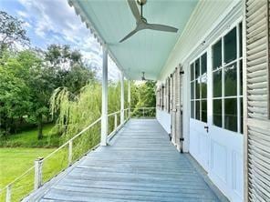 110 Mulberry Ave, Mandeville, LA 70448 - wooden terrace featuring ceiling fan and a yard
