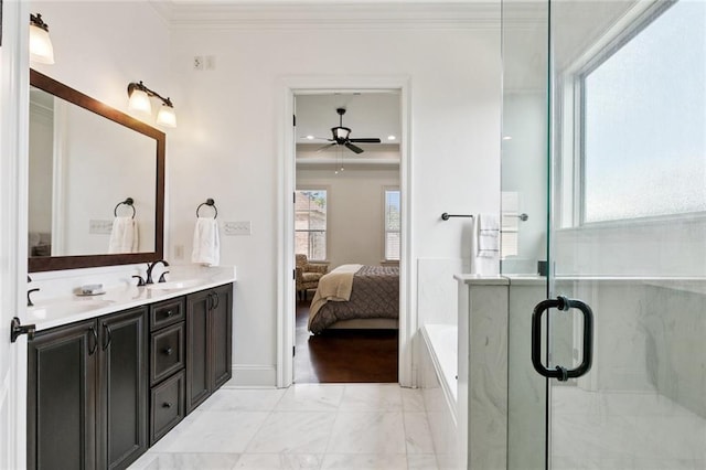 1516 Huron Ave, Metairie, LA 70005 - full bathroom featuring ceiling fan, double vanity, a garden tub, ensuite bathroom, and marble finish floors