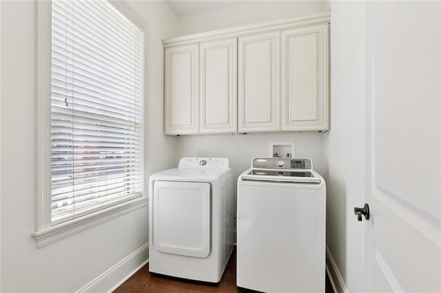 1516 Huron Ave, Metairie, LA 70005 - laundry area featuring washing machine and clothes dryer, cabinet space, and baseboards