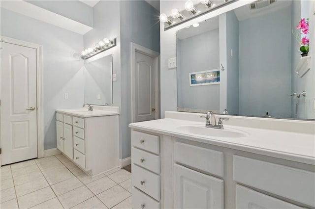 6661 Colbert St, New Orleans, LA 70124 - full bathroom with tile patterned floors and two vanities