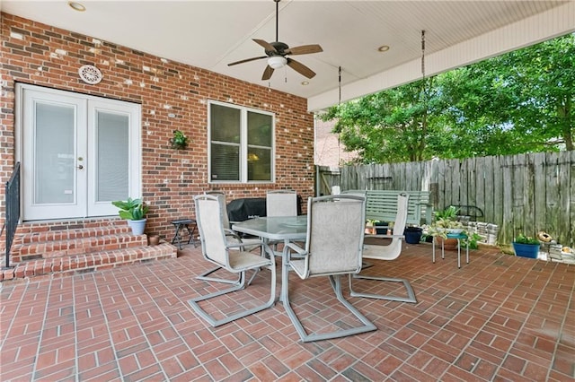 6661 Colbert St, New Orleans, LA 70124 - view of patio featuring outdoor dining area, ceiling fan, and french doors