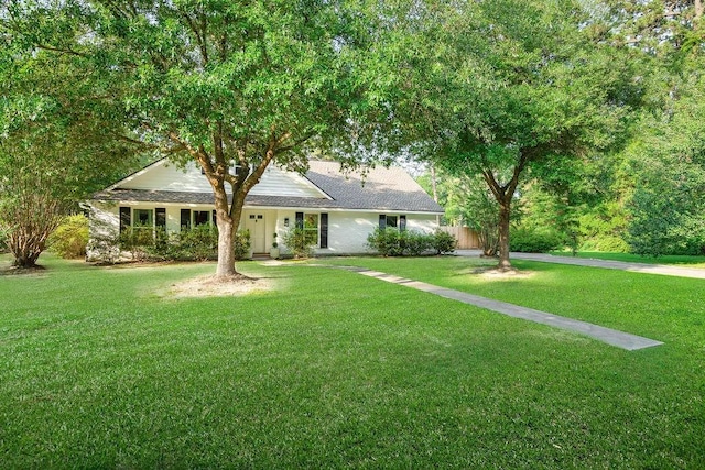 1012 W 11th Ave, Covington, LA 70433 - view of front of house with a front yard