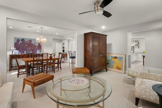 1012 W 11th Ave, Covington, LA 70433 - living room featuring ceiling fan, recessed lighting, a chandelier, and baseboards
