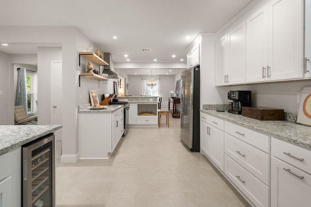 1012 W 11th Ave, Covington, LA 70433 - kitchen featuring beverage cooler, appliances with stainless steel finishes, open shelves, white cabinets, and recessed lighting