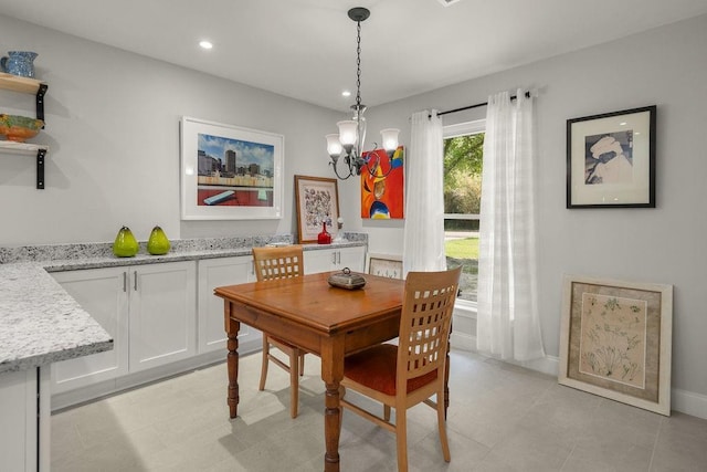 1012 W 11th Ave, Covington, LA 70433 - dining space featuring a chandelier, recessed lighting, and baseboards