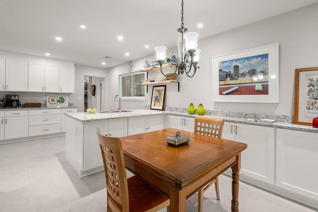 1012 W 11th Ave, Covington, LA 70433 - dining space with recessed lighting and a chandelier