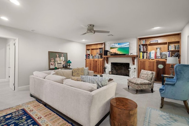 1012 W 11th Ave, Covington, LA 70433 - living room with ceiling fan, a fireplace, baseboards, recessed lighting, and built in features