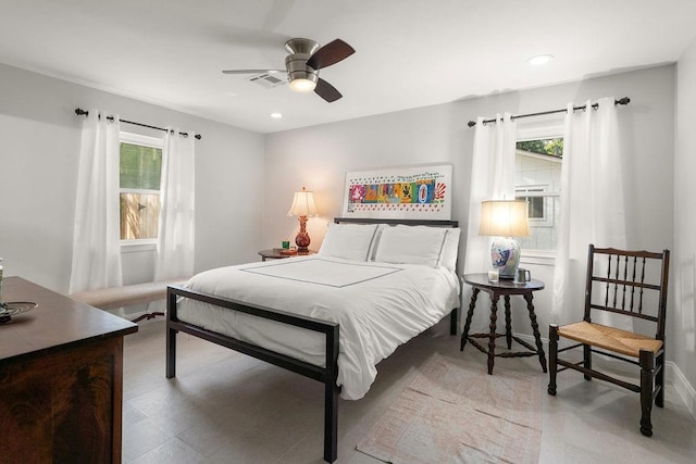 1012 W 11th Ave, Covington, LA 70433 - bedroom with multiple windows, recessed lighting, baseboards, and a ceiling fan
