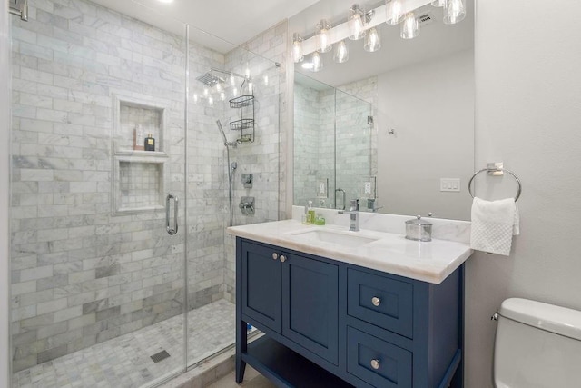 1012 W 11th Ave, Covington, LA 70433 - bathroom with a shower stall, vanity, and toilet