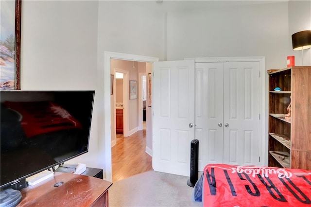 28628 Violet St, Lacombe, LA 70445 - bedroom with a closet, wood finished floors, and a desk