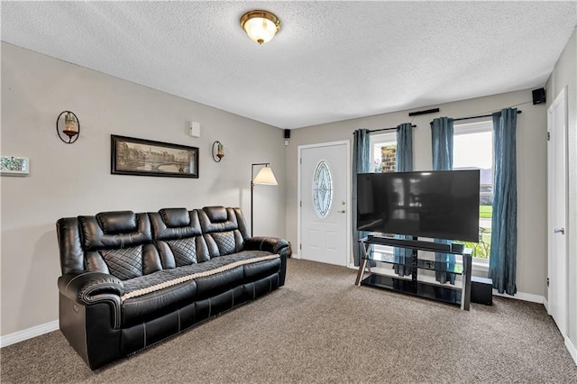 3140 Arbutus Ln, Marrero, LA 70072 - living room featuring a textured ceiling, carpet flooring, and baseboards