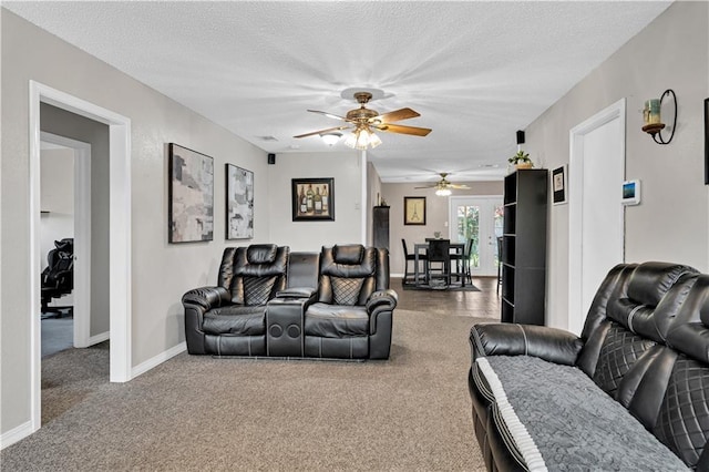 3140 Arbutus Ln, Marrero, LA 70072 - living area featuring carpet flooring, a ceiling fan, baseboards, and a textured ceiling