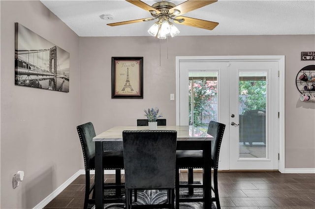 3140 Arbutus Ln, Marrero, LA 70072 - dining space featuring ceiling fan, baseboards, and french doors