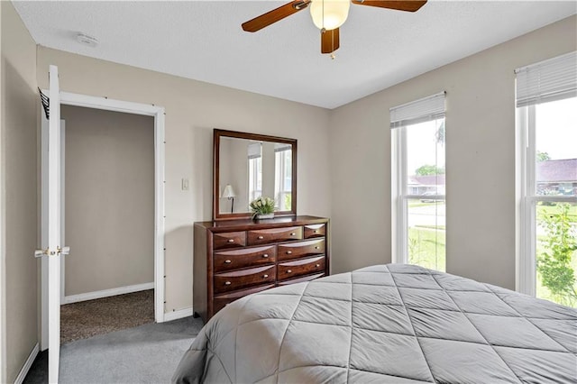3140 Arbutus Ln, Marrero, LA 70072 - bedroom featuring multiple windows, carpet, baseboards, and ceiling fan