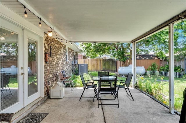 3140 Arbutus Ln, Marrero, LA 70072 - view of patio with french doors, outdoor dining space, and cooling unit