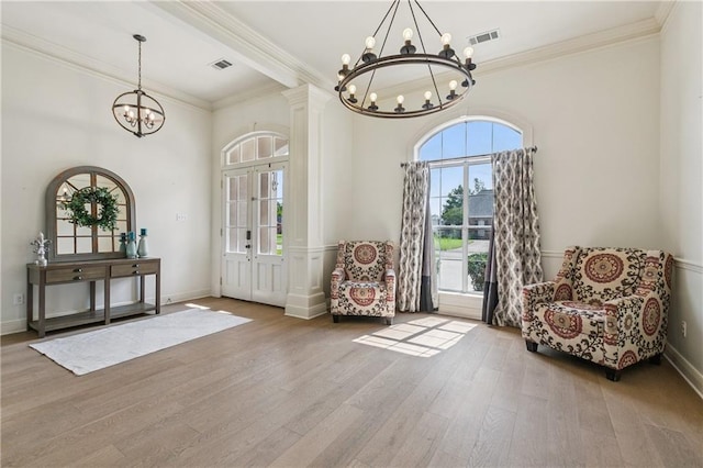108 Parkview Dr, La Place, LA 70068 - entrance foyer with a chandelier, crown molding, wood finished floors, and baseboards