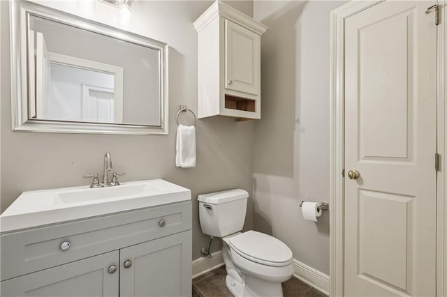 108 Parkview Dr, La Place, LA 70068 - half bath with baseboards, toilet, vanity, and tile patterned floors