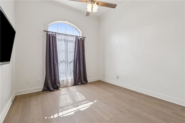 108 Parkview Dr, La Place, LA 70068 - spare room featuring wood finished floors, crown molding, ceiling fan, and baseboards