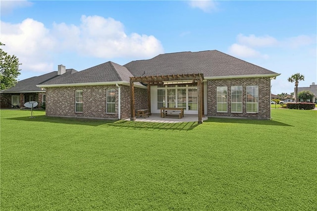 108 Parkview Dr, La Place, LA 70068 - rear view of property featuring a pergola, a patio area, a yard, and brick siding