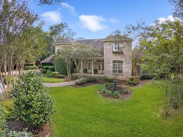 20 Beechwood Gardens Ln, Covington, LA 70435 - back of house featuring a lawn and brick siding