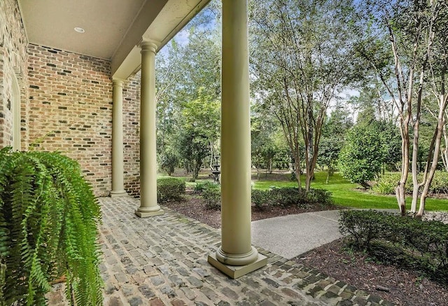 20 Beechwood Gardens Ln, Covington, LA 70435 - view of patio / terrace with view of scattered trees