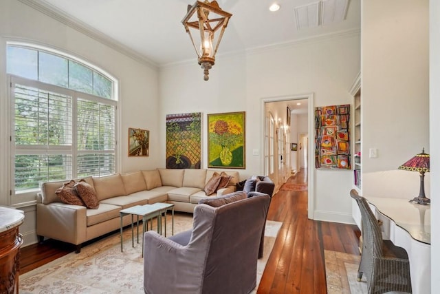 20 Beechwood Gardens Ln, Covington, LA 70435 - living room featuring plenty of natural light, ornamental molding, wood-type flooring, and baseboards