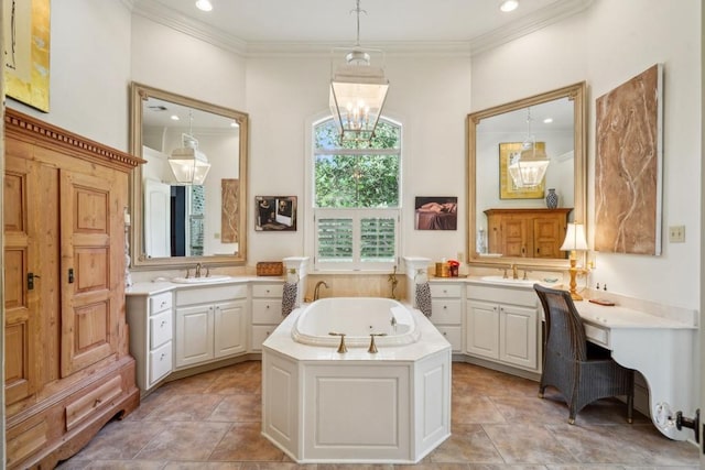 20 Beechwood Gardens Ln, Covington, LA 70435 - bathroom featuring ornamental molding, a jetted tub, two vanities, recessed lighting, and stone finish floors