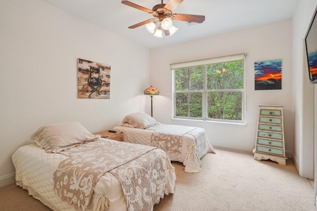 20 Beechwood Gardens Ln, Covington, LA 70435 - carpeted bedroom featuring baseboards and a ceiling fan