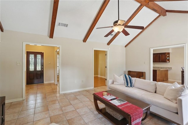 111 Thatcher Dr, Slidell, LA 70461 - living area featuring a ceiling fan, beamed ceiling, light tile patterned floors, high vaulted ceiling, and baseboards