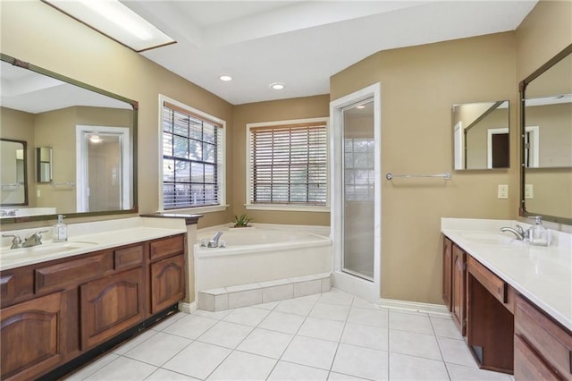 111 Thatcher Dr, Slidell, LA 70461 - full bath with a garden tub, two vanities, tile patterned flooring, a shower stall, and recessed lighting