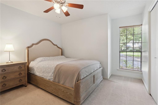 111 Thatcher Dr, Slidell, LA 70461 - bedroom featuring light colored carpet, baseboards, and a ceiling fan